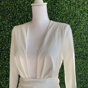 Long sleeve white deep plunge dress